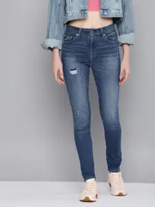 Levis Women 721 Skinny Fit High-Rise Low Distress Light Fade Stretchable Jeans