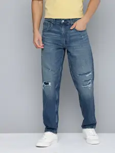 Levis Men 550'92 Relaxed Fit Mildly Distressed Heavy Fade Stretchable Jeans