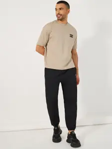 Styli Minimal Graphic Mock Neck Oversized T-Shirt With Joggers