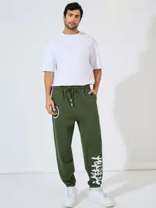 Styli Olive Green Naruto Shippuden Graphic Printed Pure Cotton Oversized Joggers