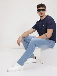 The Roadster Life Co. Men Slim Fit Mid-Rise Heavy Fade Stretchable Jeans