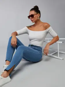 DOLCE CRUDO Women Skinny Fit High-Rise Mildly Distressed Light Fade Stretchable Jeans