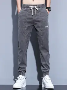 StyleCast Men Medium Shade High-Rise Jogger Jeans