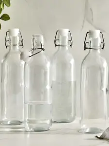 Home Centre Transparent Set of 4 Glass Solid Water Bottle