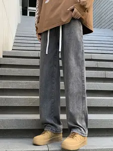 StyleCast Men Wide Leg Low Distress Light Fade Jeans