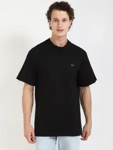 Calvin Klein Jeans Men Solid Round Neck Cotton Relaxed Fit T-shirt