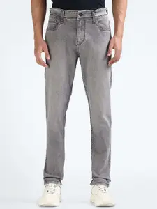 Flying Machine Men Tapered Fit Heavy Fade Stretchable Jeans