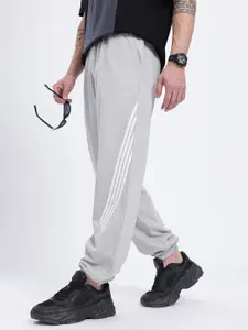glitchez Men Side Striped Mid-Rise Baggy Fit Joggers with Toogled Hem