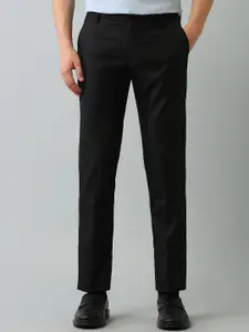 Arrow Men Solid Mid Rise Tapered Fit Trousers