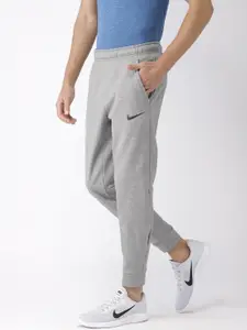 Nike Men Grey Solid Standard Fit THRMA DRI-FIT Technology Joggers