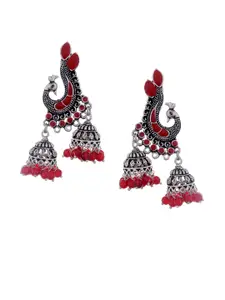 Silvermerc Designs Silver-Toned & Red Peacock Shaped Jhumkas