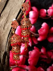 ANIKAS CREATIOn Gold Plated & Red Enamelled Peacock Shaped Jhumkas