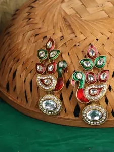 ANIKAS CREATION Gold-Plated & Maroon Peacock Shaped Jhumkas