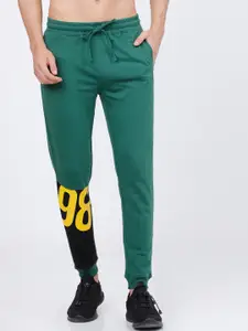 The Indian Garage Co Men Green & Yellow Solid Slim-Fit Joggers