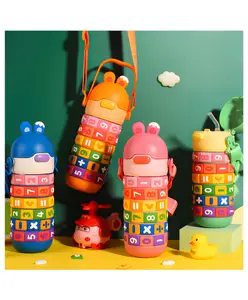 SCHOOLISH Kids Educational Water Bottle with Math Learning Puzzle, Rainbow Numbers and Symbols, Portable Drink Container with Shoulder Strap 430 ml - PACK OF 1 - COLOR MAY VARY