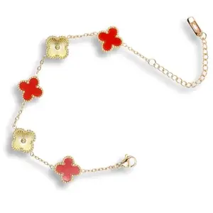 Elegant Chain Bracelet with Red Clover and Gold Sunburst Motifs