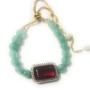 Adjustable Bracelet with Mint Green Beads, Ruby Red Crystal Pendant, Gold Chain and Pearl Accents