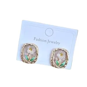 Fashion Jewelry Women's Floral Stud Earring | Lightweight Earrings| Casual, Party & Office Wear Jewelry (Transparent Petal Design & Green Leaf Detailing)