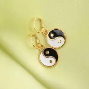 Yin Yang huggie earrings