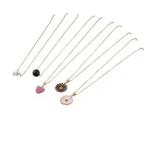 MALKYN Women's Cute Charm Pendant Necklace Set – Pearl, Black Bead, Pink Heart, Black & White Flower Pendant – Lightweight Gold-Plated Chain Jewelry for Girls