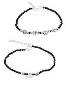 Atibelle set of 2 German silver- plated & black -white beaded floral- bird shaped anklets