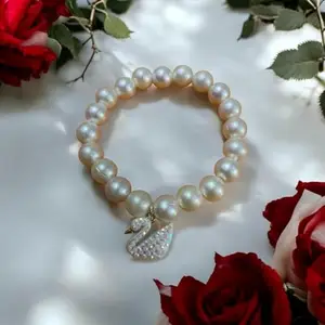 Pearl Bracelet with Crystal Swan Charm, White Faux Pearls, Elastic Stretch