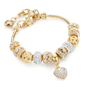 Shining Diva Fashion Latest Stylish Gold Crystal Charm Gift Bracelet for Women and Girls (15730b)
