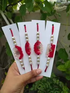 Handcrafted Pearl and Resin Rakhi Set, Red and White with Gold-tone Accents, Traditional Design, Pack of 4