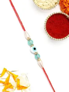 Karatcart Stylish Light Blue Beads Evil Eye Handmade Rakhi for Brother with Roli & Chawal