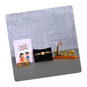 Poorak Religious Assorted Rakhi Gift Set – Ganesha Rakhi with Love Gift & Roli Chawal