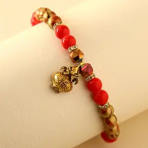 fnp Sneh Gracious Wooden Beads Bracelet Rakhi for Brother, Bhaiya, Bhai