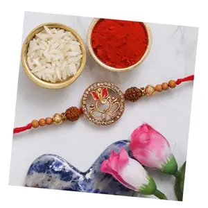 eCraftIndia Lord Ganesha with Rudraksha Religious Designer Rakhi with Roli Chawal Pack - Rakhi for Brother