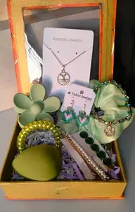 Aspire T Green Hamper for Women Multi Accessories 1 Green Scrunchies, 1 Green Butterfly Clutcher, 2 Hair Pins, 1 Hand bracelate, 1 Spring Rubber, 1 Nacklaces Chain1 Earrings and 1 Beauty Blender with