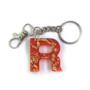 "R" Letter/Alphabets Handmade Resin Keychain by LFF by Soniya Themed in Dried Natural Flowers/Glitters/Stones/Gold-Silver-Copper Flakes Filled for Men and Women - Letter "R" (Design#4)