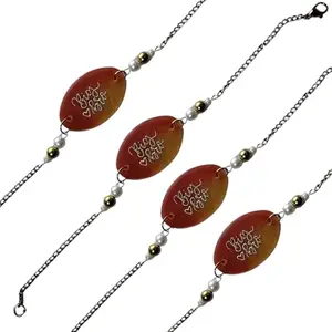 Decorative Rakhi Bracelet with Orange Oval Pendant, Pearl and Gold Beads, Traditional Gift Box