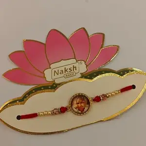 Guru ji Rakhi Bracelet with Pearl and Crystal Beads, Pink Lotus Design, Traditional Gold-Tone Display Card