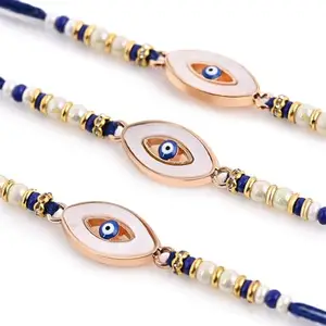 CHOTTEY LAL AND SONS Rakshabandhan Evil Eye Designer Thread Rakhi with Roli Chawal and Card Combo | Traditional Rakhi For Brothers and Sisters (Set Of 3)