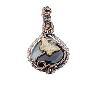 Handcrafted Wire-Wrapped Agate Pendant with Golden Butterfly, Black and White Stone, Copper-Toned Metal