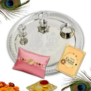 Avirons Traditional Rakhi Gift Set for Brother – beautifully crafted Rakhi, silver finish Pooja Thali, ritual Roli Chawal, and greeting card – all arranged for the perfect Raksha Bandhan celebration.
