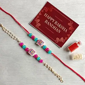 Craftcart Handcrafted Meenakari Rakhi Set for Bhaiya Bhabhi (Pink, Blue) | Couple Rakhi Set with Roli Chawal Pack