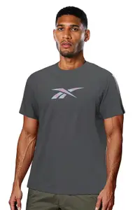 Visit the Reebok Store Reebok Men’s ColourBurst Vector Performance T-Shirt, Moisture Wicking Activewear Tee with Bold Graphic Design