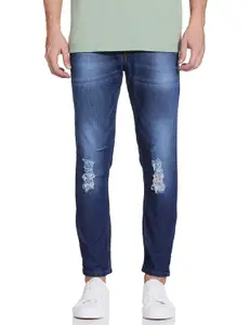 Visit the The Indian Garage Co Store The Indian Garage Co Men Carrot Fit Solid Mid-Rise Stretchable Jeans